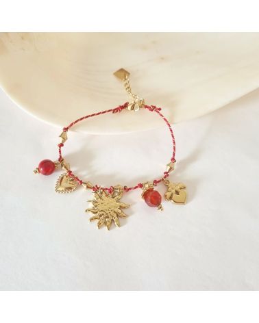 bracelet sur fil rouge et lurex breloques soleil
