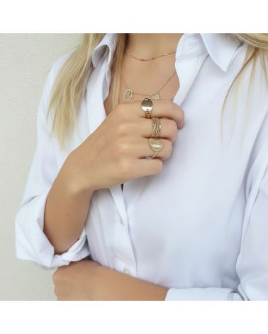 bague femme plaqué or 18 carats médaille motif végétal