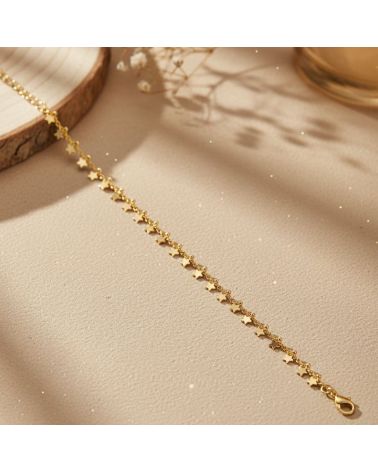 bracelet pour femme plaqué or 18 carats finement orné de pampilles étoiles