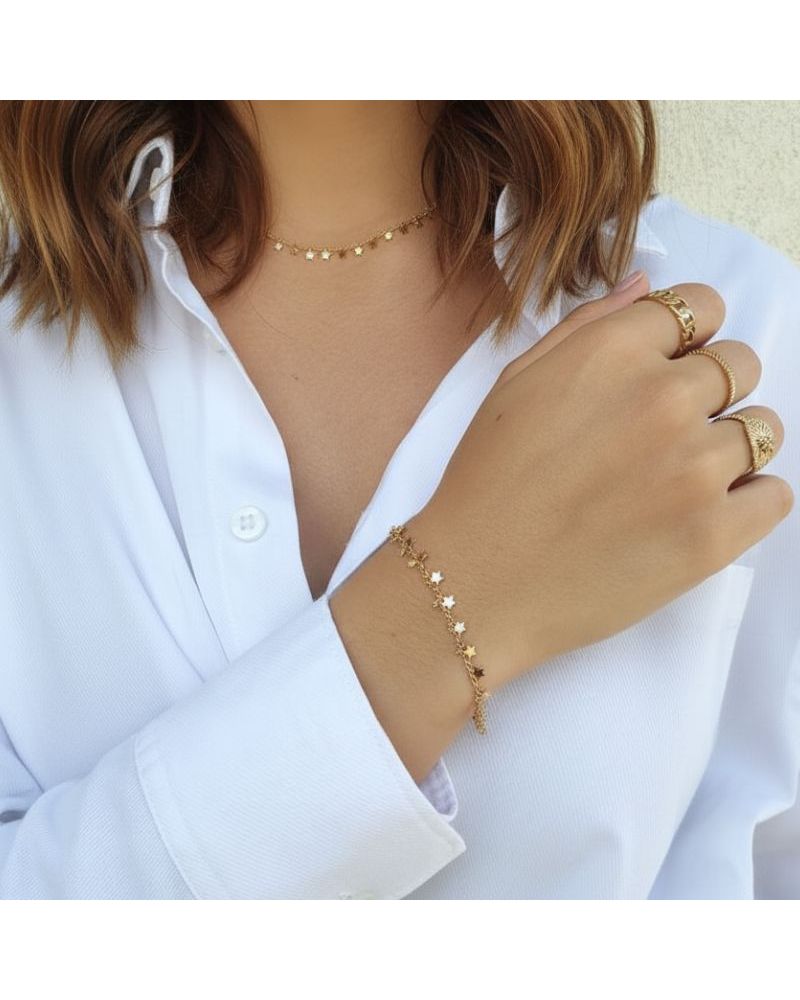 bracelet pour femme plaqué or 18 carats finement orné de pampilles étoiles bracelet pour femme plaqué or 18 carats finement orné de pampilles étoiles