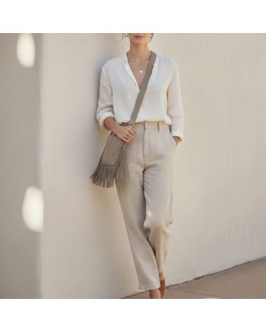 pochette en daim à franges porté en bandoulière ou croisé style boheme chic