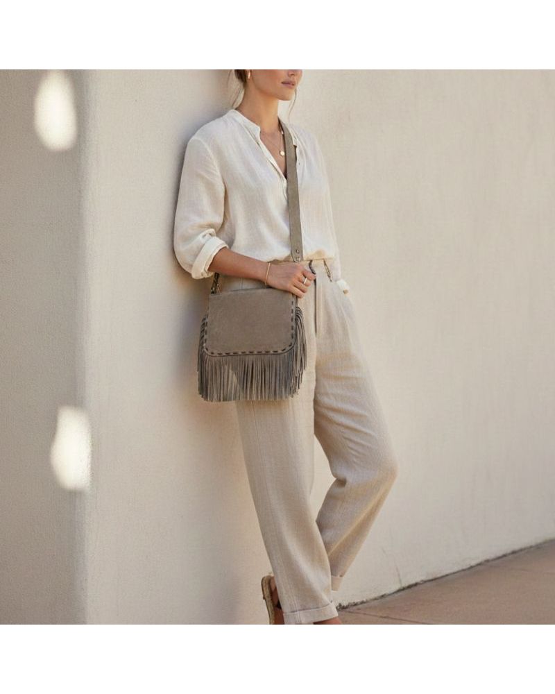 pochette en daim à franges porté en bandoulière ou croisé style boheme chic