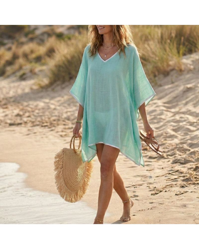 Caftan court washed vert aqua porté par une femme sur la plage