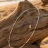 collier perles d'eau & talisman collier fin perles d'eau & talisman