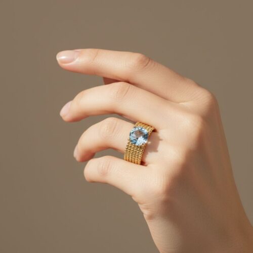 bague large pour femme en plaqué or avec maille perlée et pierre facettée teintée couleur aigue marine